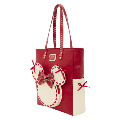 Red and white tote bag with bow design on a white background