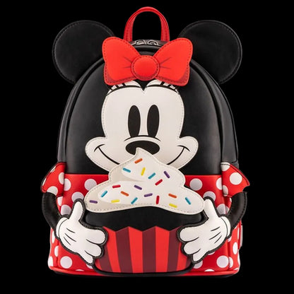 Backpack designed like a character with a red bow and cupcake design on a white background