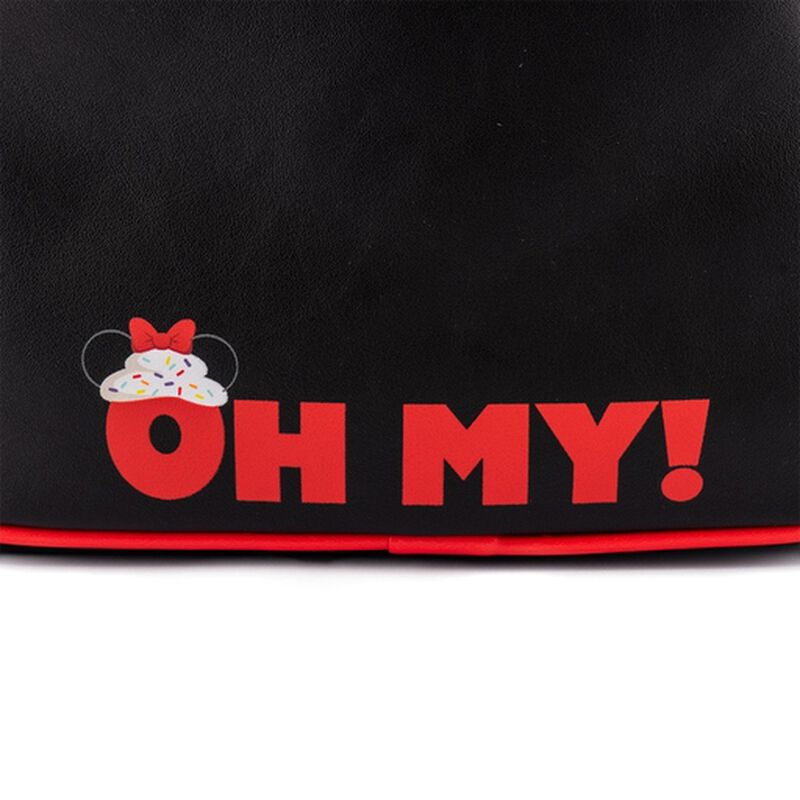 Black apron with red text 'OH MY!' and a cartoon character on a white background