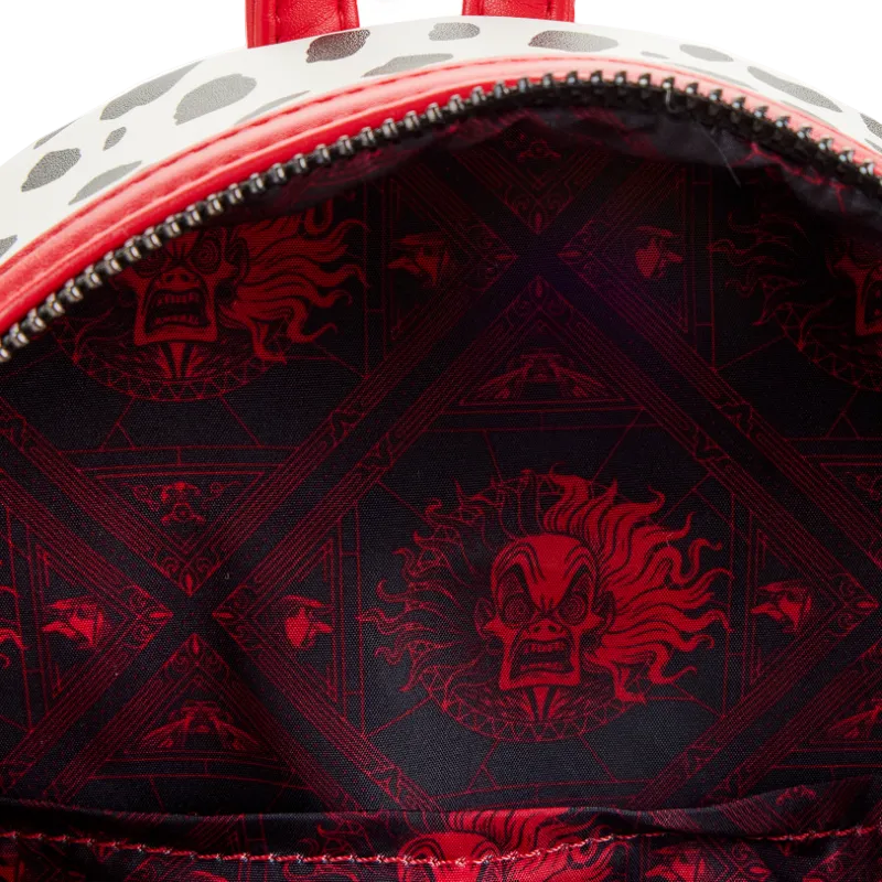 Close-up of a red and black patterned bag with a dragon design.