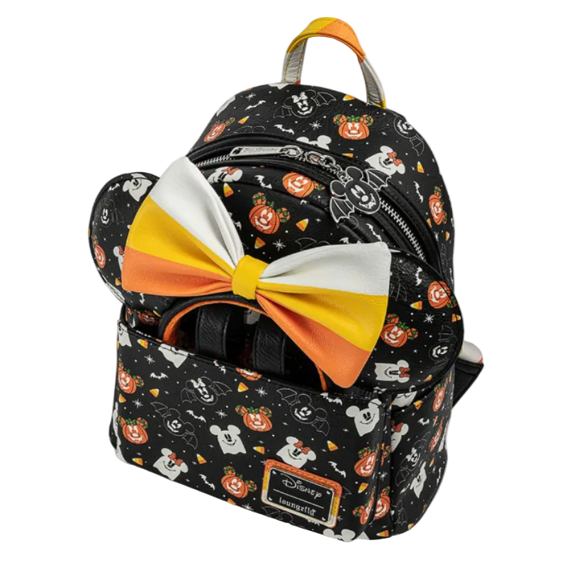 Backpack with Halloween-themed design and large bow on a white background