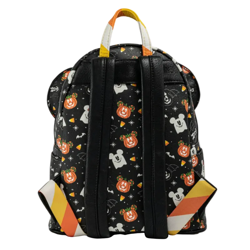 Backpack with Halloween-themed design featuring pumpkins, ghosts, and candy corn on a black background.