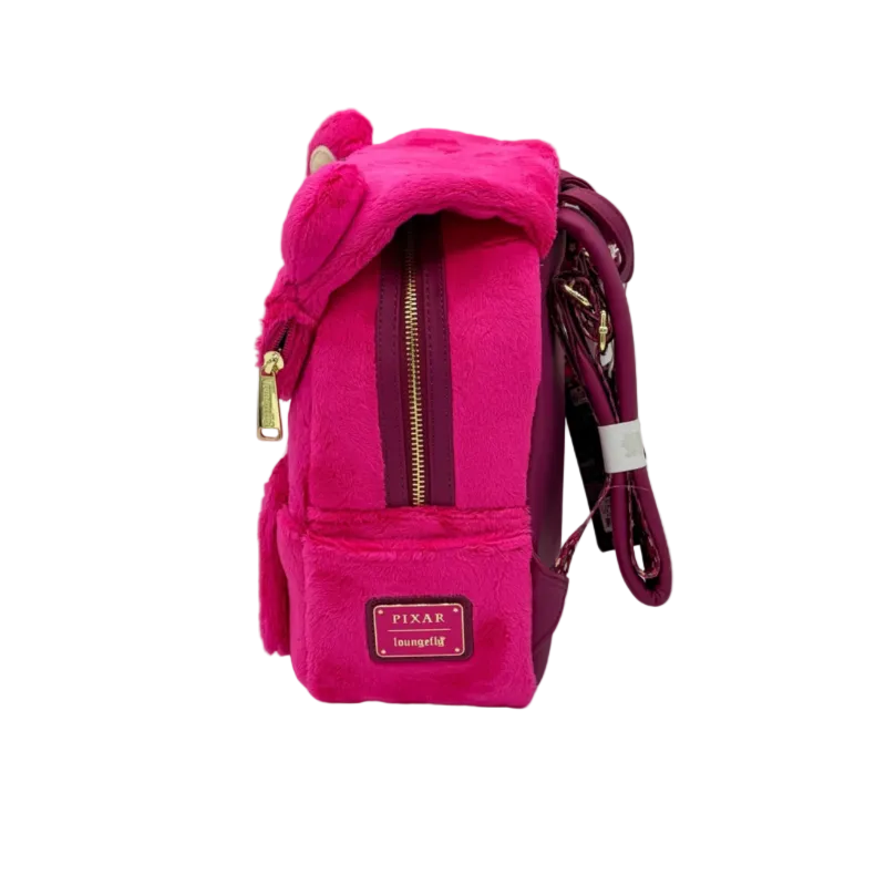 Pink backpack with plush bear ears on a gray background