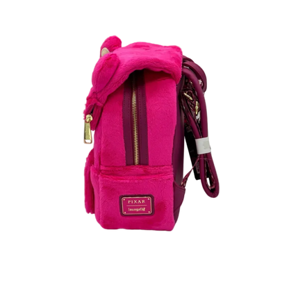 Pink backpack with plush bear ears on a gray background