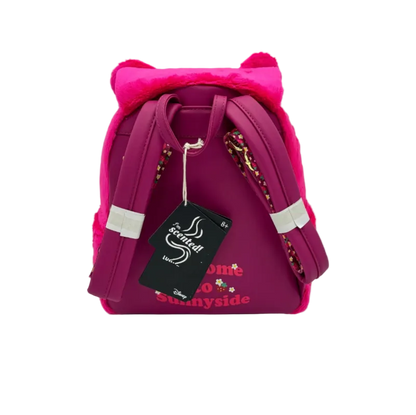 Pink backpack with cat ears and a tag on a light gray background