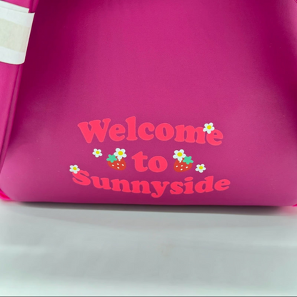 Pink bag with 'Welcome to Sunnyside' text and strawberry graphics on a white background
