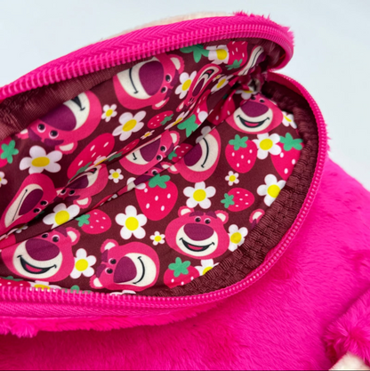 Pink pouch with cartoon animal pattern on a white background