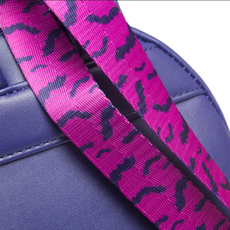 Purple sandal with a pink camouflage strap on a white background