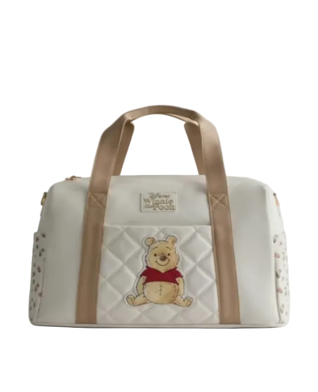 Bag with Winnie the Pooh design on a light gray background