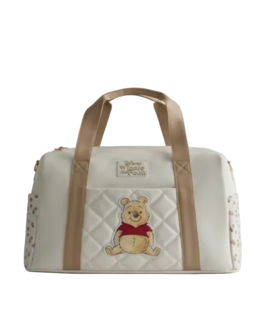 Bag with Winnie the Pooh design on a light gray background
