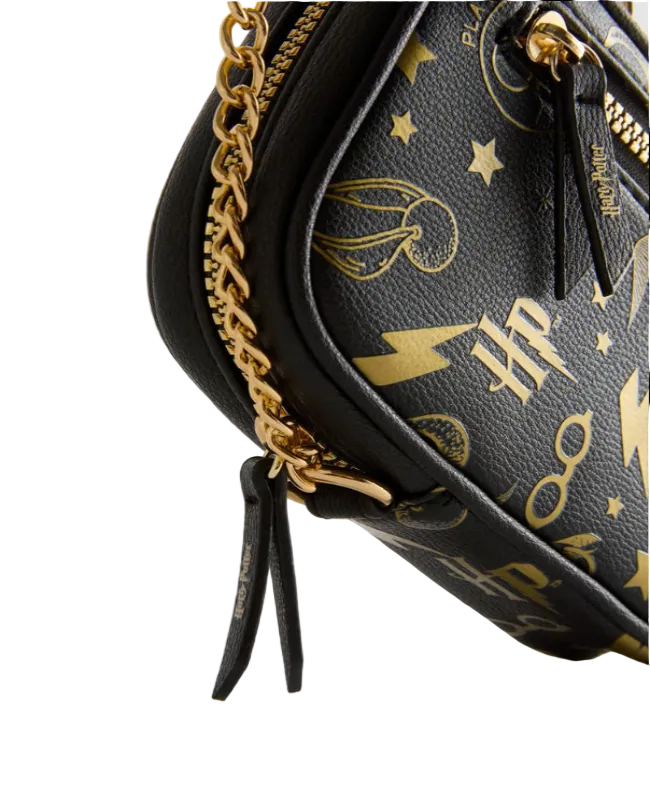 Black handbag with gold accents and Harry Potter logo on a light gray background