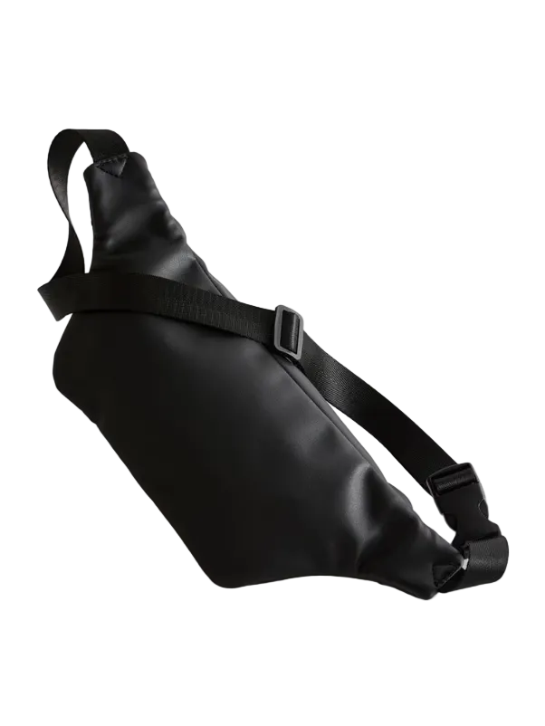 Black leather waist bag on a light gray background