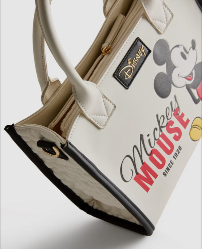 Handbag with Mickey Mouse design and Disney logo on a light background