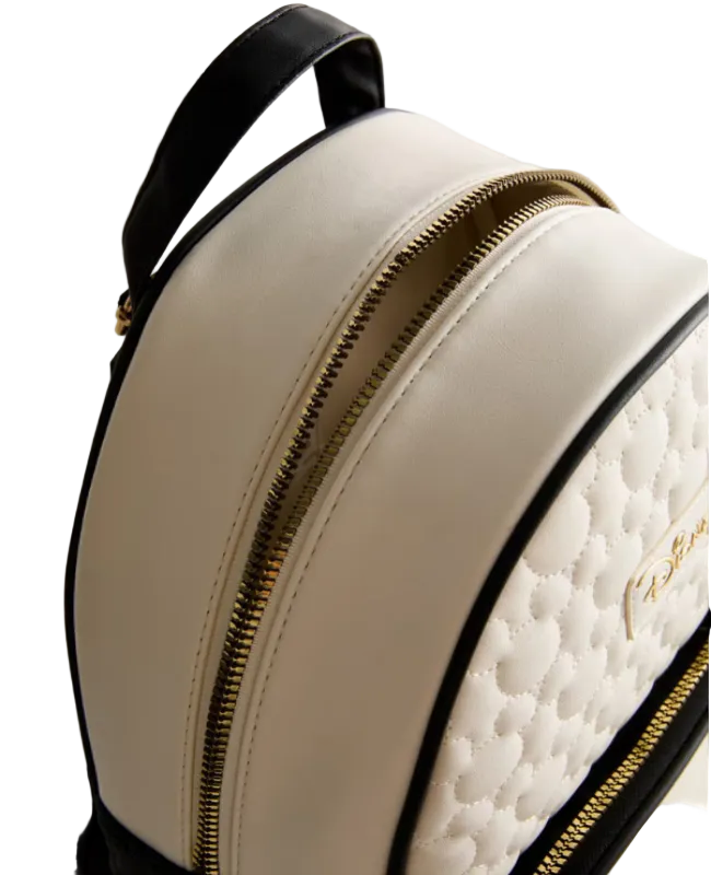 Beige backpack with gold zipper and black handle on a light gray background