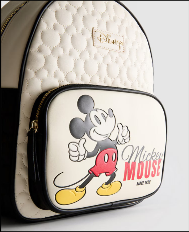 Backpack with Mickey Mouse design and Disney logo on a light background