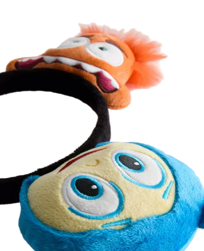 Two plush toys with exaggerated facial expressions on a white background