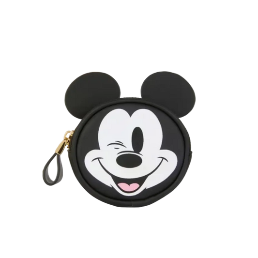 Circular pouch with a cartoon face design on a white background