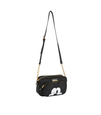 Black crossbody bag with a character design on a light gray background