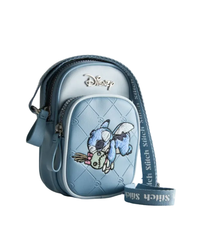 Blue crossbody bag with Disney character design on a light gray background