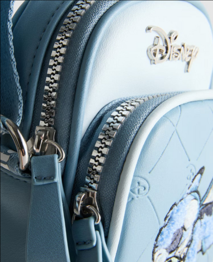 Close-up of a light blue backpack with a zipper and Disney logo.