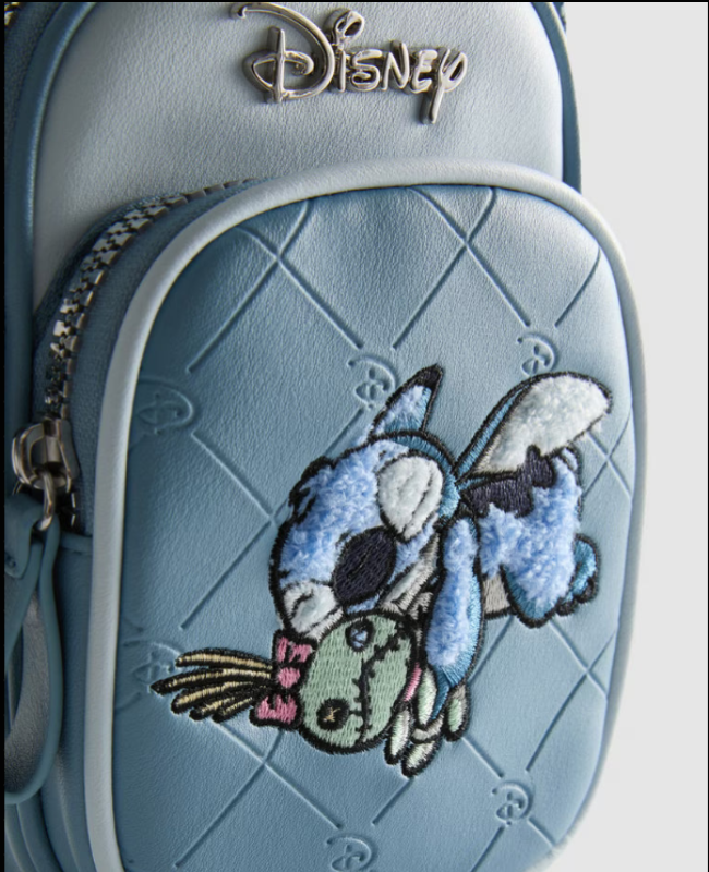 Light blue handbag with embroidered character design and Disney logo.