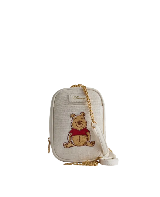 Small beige pouch with embroidered bear design on a white background