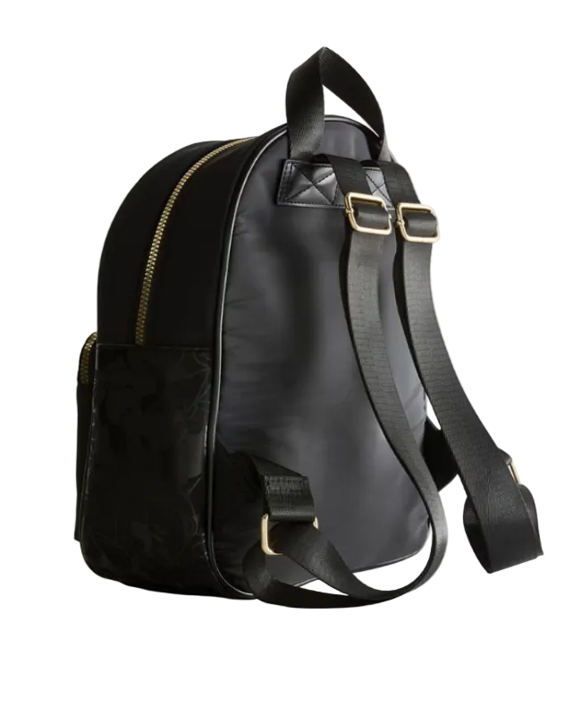 Black backpack with gold zippers on a light gray background