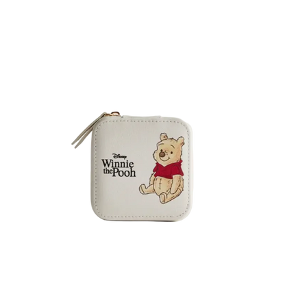 Small pouch with Winnie the Pooh design on a white background