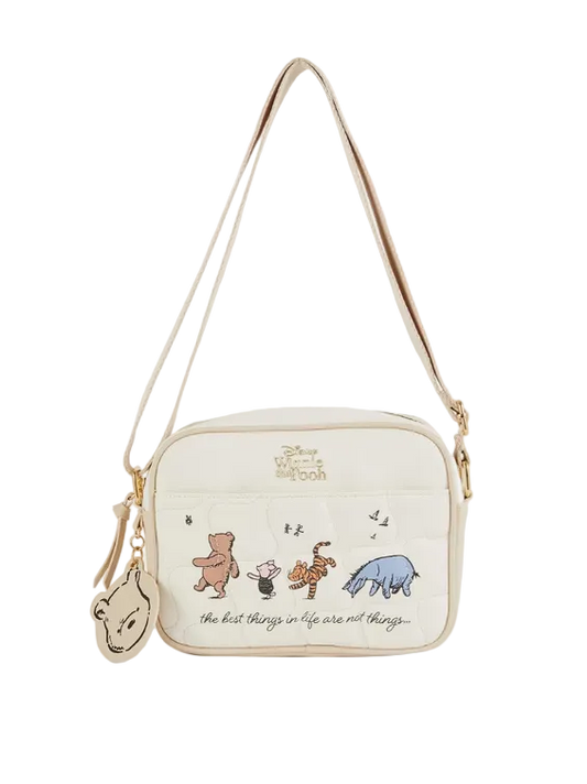 Crossbody bag with illustrations of characters and text on a white background