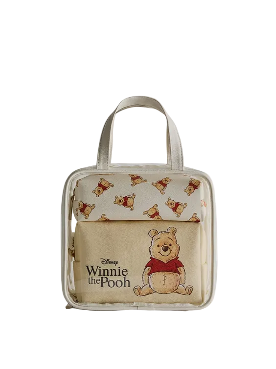 Transparent handbag with Winnie the Pooh design on a light gray background