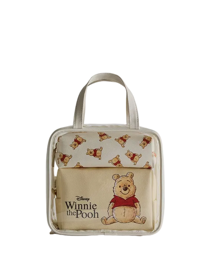 Transparent handbag with Winnie the Pooh design on a light gray background