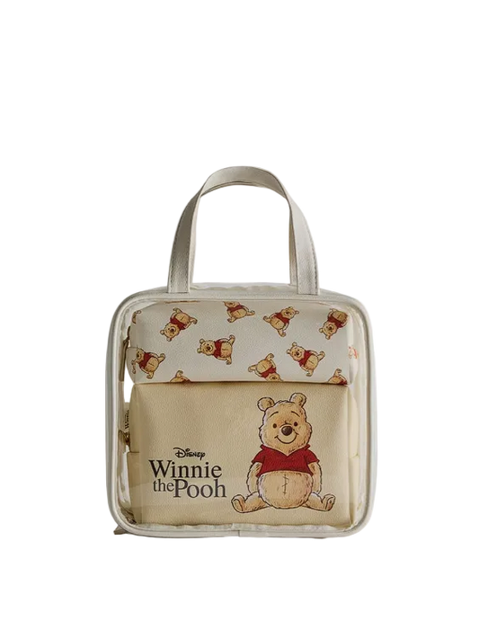 Transparent handbag with Winnie the Pooh design on a light gray background