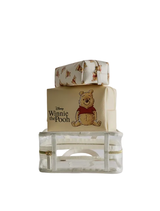 Winnie the Pooh-themed gift box with a clear container underneath on a white background