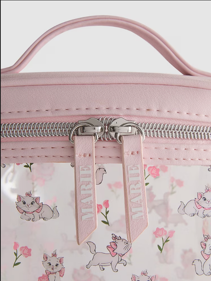 Pink cosmetic bag with floral and cat pattern, featuring a visible brand tag.