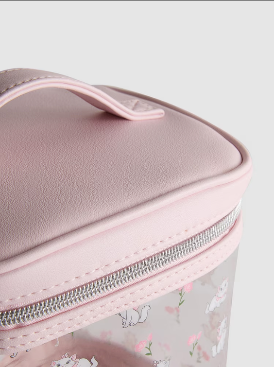 Pink cosmetic bag with floral pattern on a light gray background