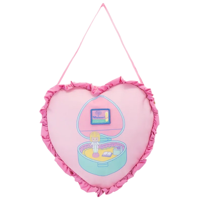 Heart-shaped pink pillow with a toy inside on a white background