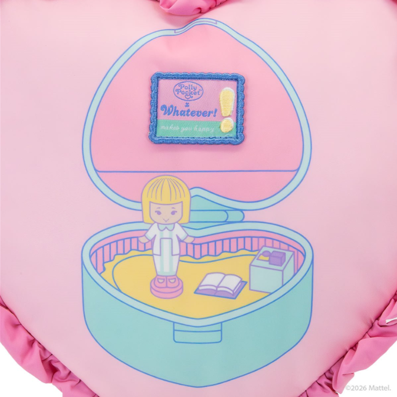 Pink toy with a character inside an open jewelry box on a pink background