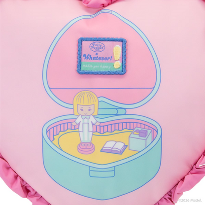 Pink toy with a character inside an open jewelry box on a pink background