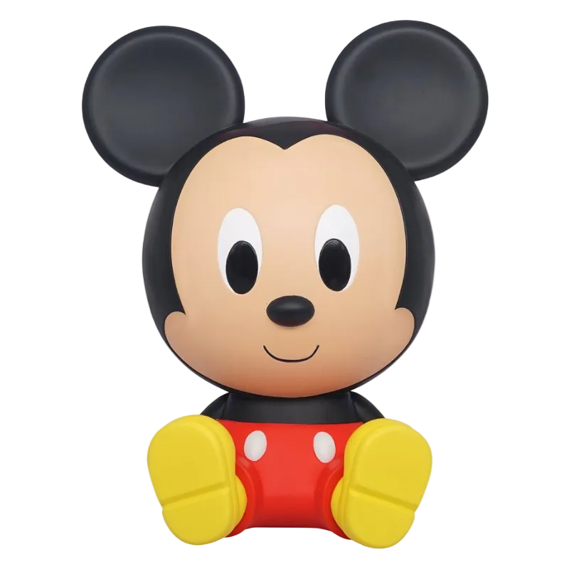 Mickey Mouse figurine with black ears, red outfit, and yellow shoes on a white background