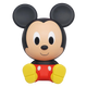 Mickey Mouse figurine with black ears, red outfit, and yellow shoes on a white background