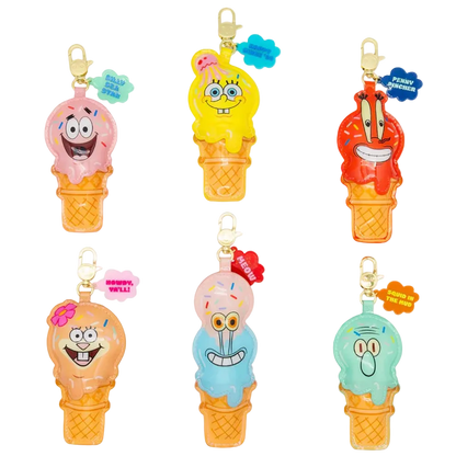 Set of colorful ice cream cone keychains with cartoon characters on a white background