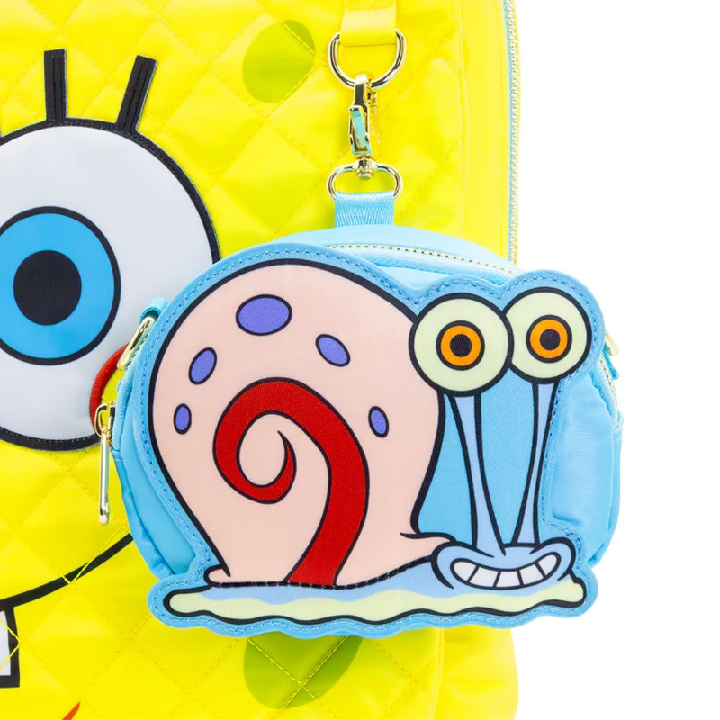 Colorful character purse with a yellow background