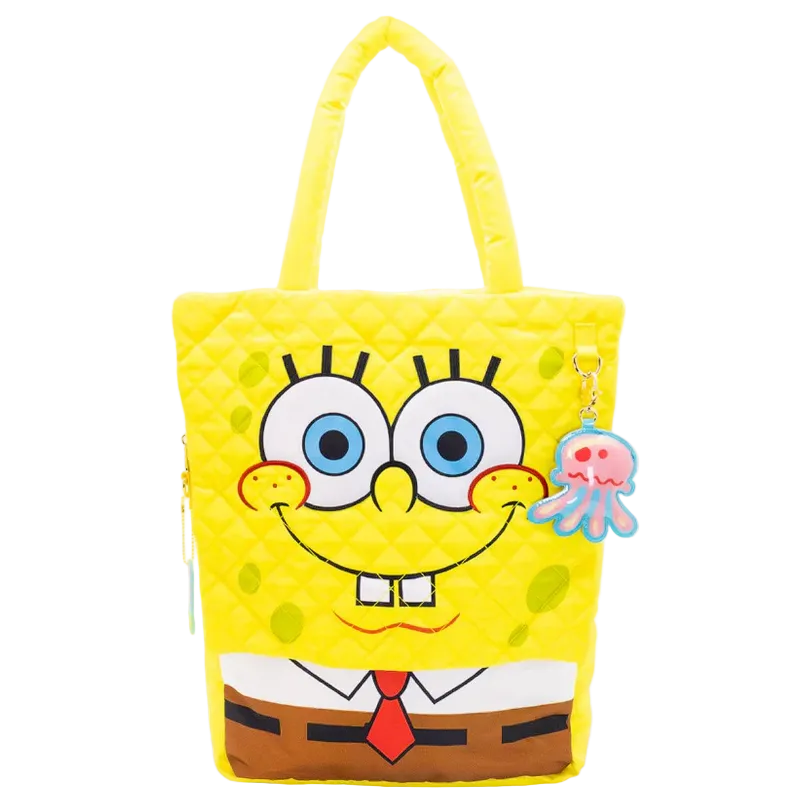 Yellow tote bag with a cartoon character face on a white background