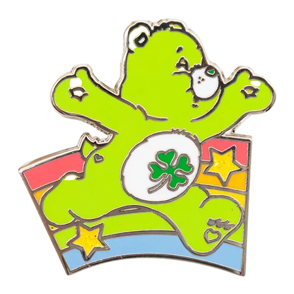 Colorful bear-shaped pin with a shamrock design on a white background