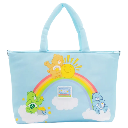 Light blue tote bag with cartoon characters and a rainbow on a white background