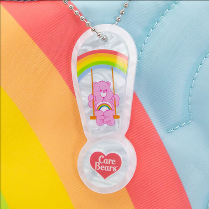 Clear sandal-shaped pendant with a pink Care Bear character on a colorful background