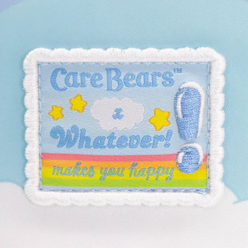 Care Bears patch with 'Whatever! makes you happy' text on a light blue background