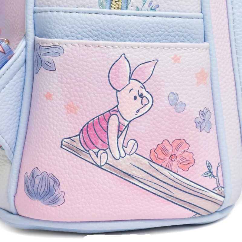 Pastel-colored pouch with a cartoon character on a white background