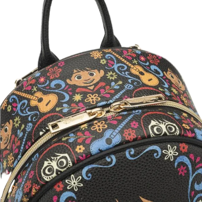 Colorful backpack with floral and musical instrument patterns on a black background