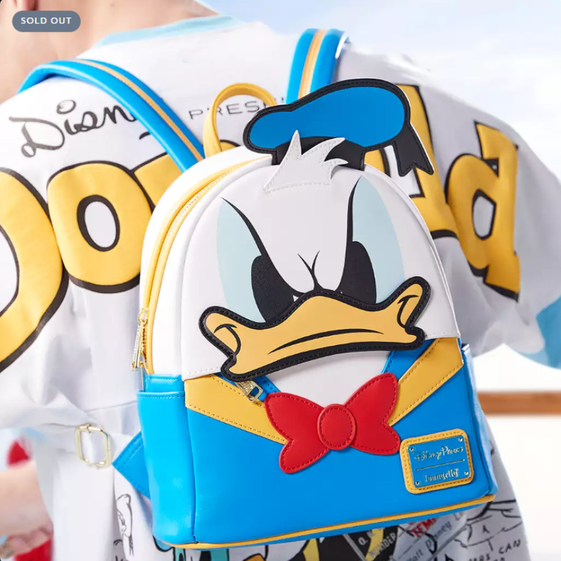 Backpack with Donald Duck design in front of a Disney shirt